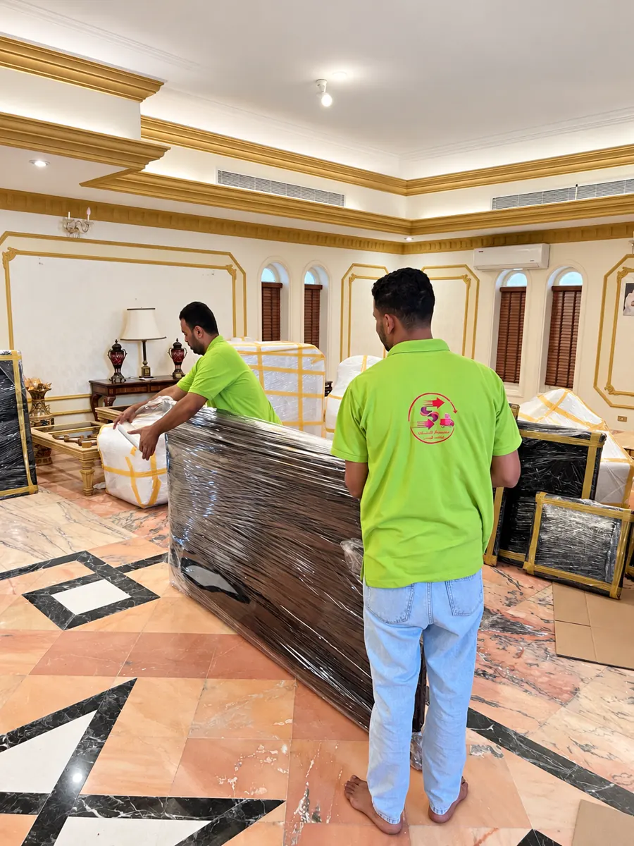 Furniture packing inside a villa Al Siham team wrapping furniture inside a furnished villa